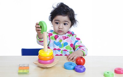 Baby playing with toys