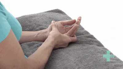 Moving image of someone massaging the palm of one hand with the other